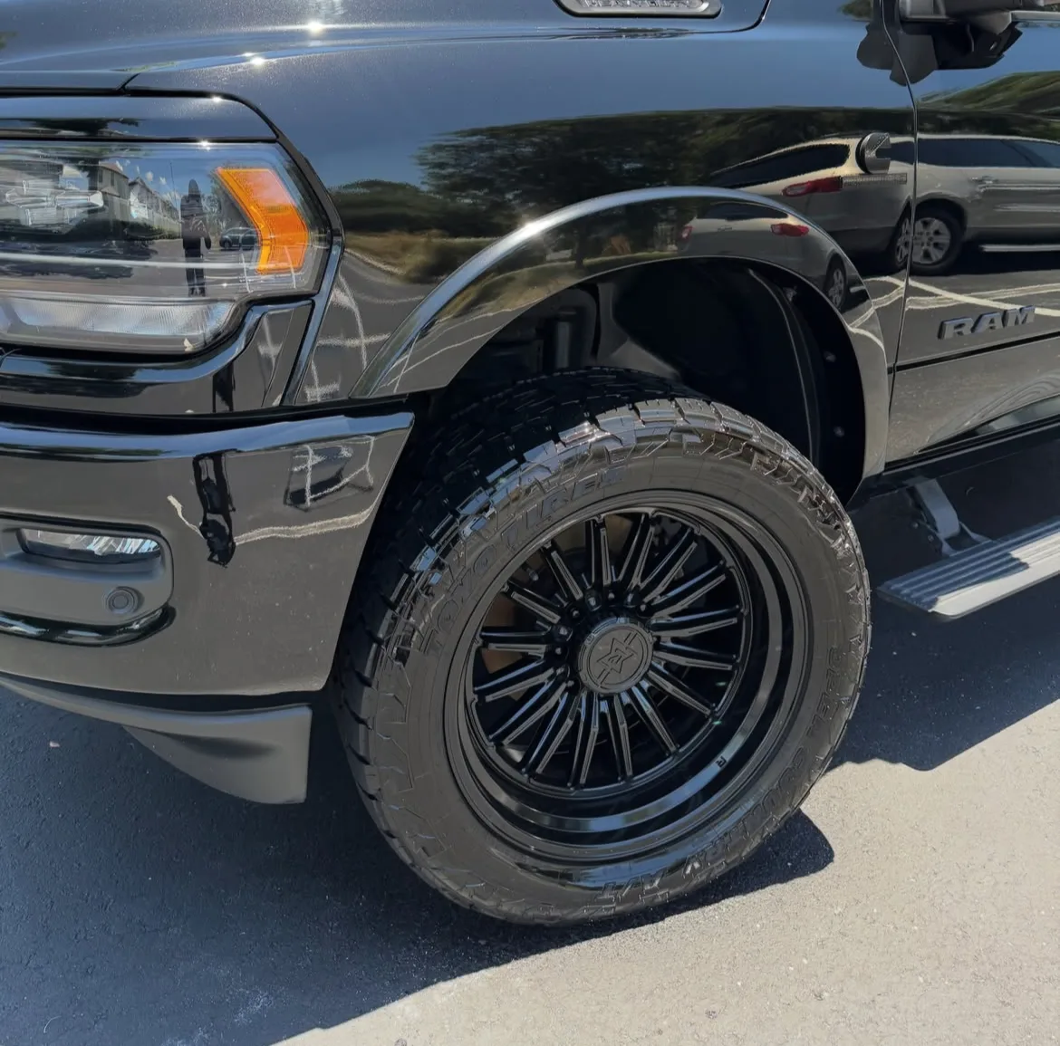 Glossy detailed Ram truck fender and wheel
