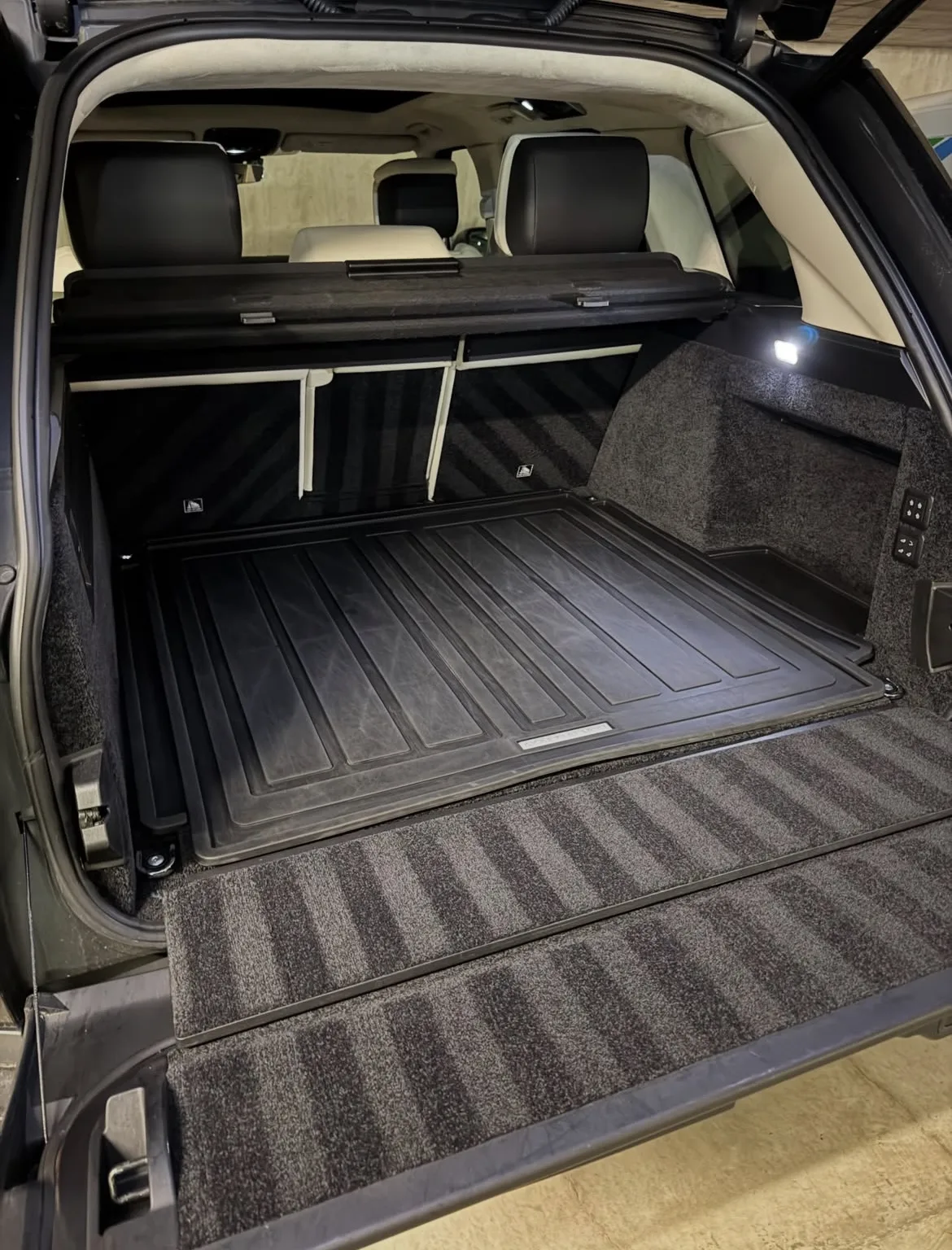 Detailed SUV cargo area and trunk liner