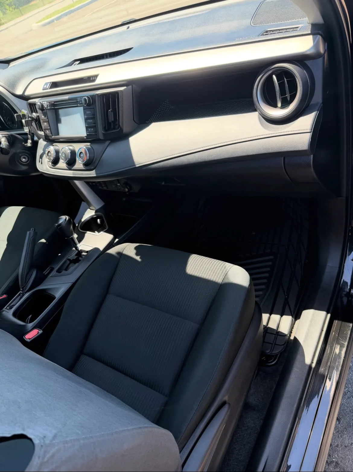 Detailed Toyota RAV4 dashboard and front seat